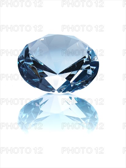 Diamond on white background. Photo : David Arky