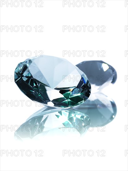 Two diamonds on white background. Photo : David Arky