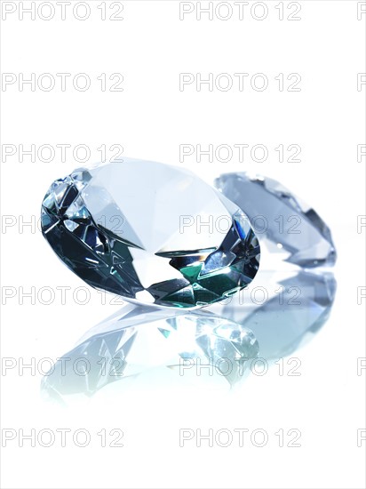Two diamonds on white background. Photo : David Arky