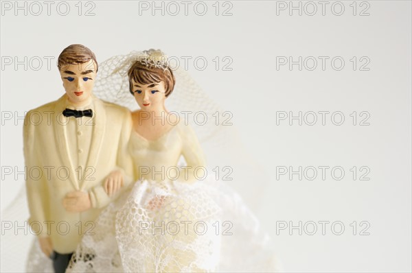 Studio shot of bride and groom figurines. Photo : Antonio M. Rosario
