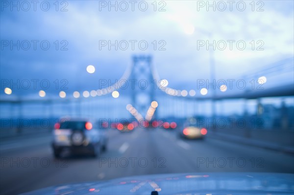 USA, San Francisco, Driving on Golden Gate Bridge. Photo: Noah Clayton