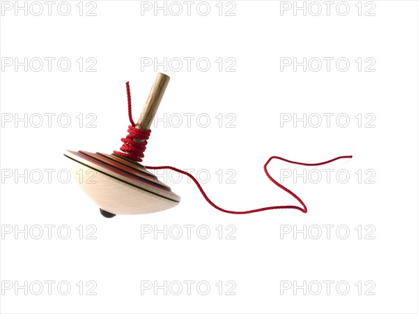 Spinning top on white background. Photo: David Arky