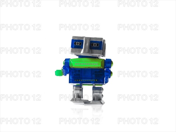 Toy robot on white background. Photo: David Arky