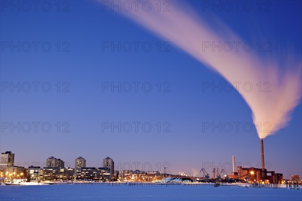 Finland, Helsinki, Smoking chimney in dock. Photo : Henryk Sadura