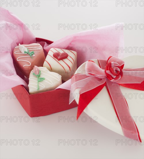 Studio shot of box of heart-shaped candies. Photo: Daniel Grill