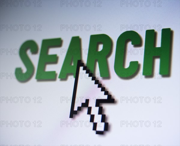 Studio shot of arrow cursor on search button. Photo : Jamie Grill Photography