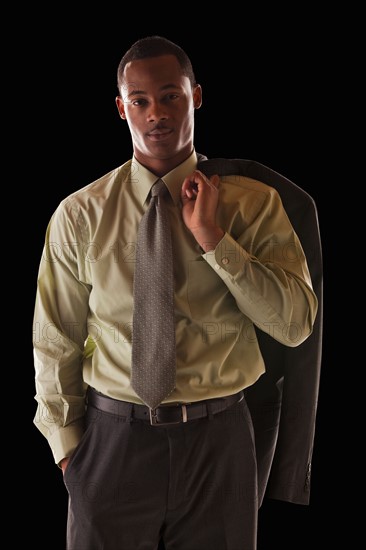 Portrait of confident businessman. Photo : Mike Kemp