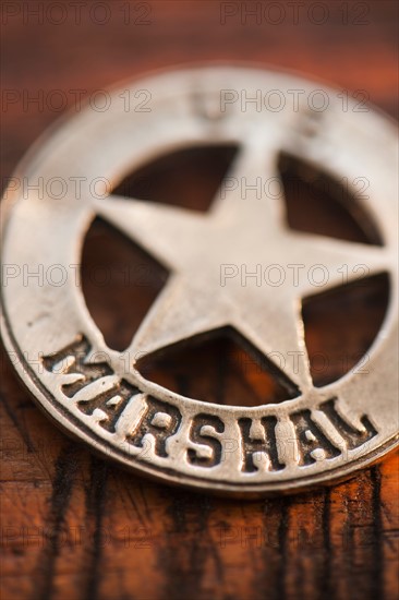 Close-up of United States Marshal badge.