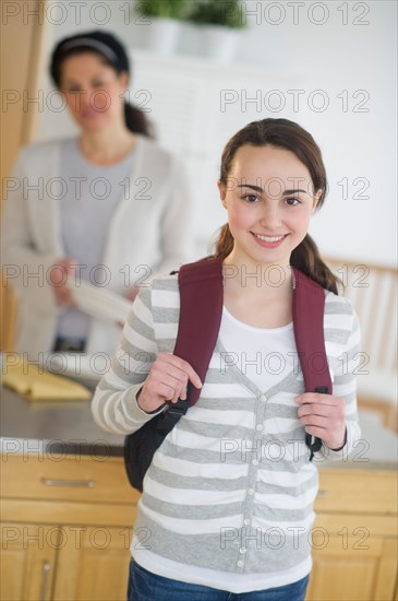 Mother and teenage daughter (14-15).