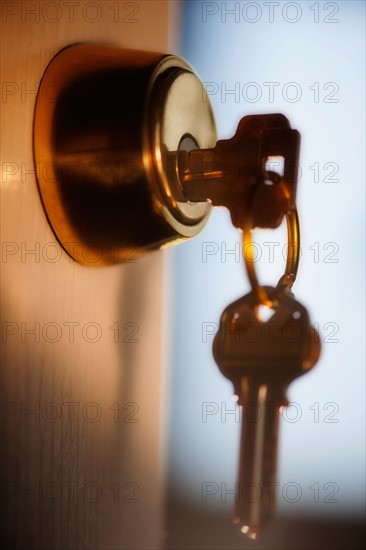 Keys hanging from front door.