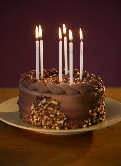 Studio shot of chocolate birthday cake.