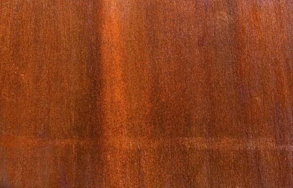 Close-up of brown wooden surface.