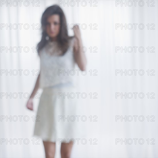 Portrait of young woman, defocused.