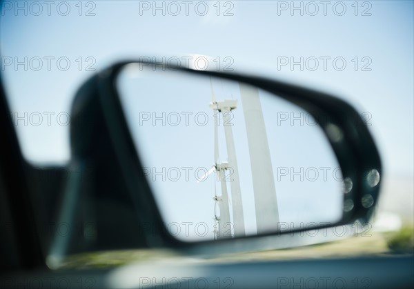 USA , California, Palm Springs, Coachella Valley, San Gorgonio Pass, Wind turbine reflecting in rear- view mirror . Photo : Jamie Grill Photography