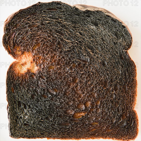 Close up of burnt toast. Photo : Jamie Grill Photography