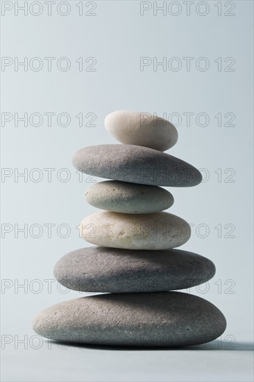 Studio shot of rocks balancing on one another. Photo : Chris Hackett