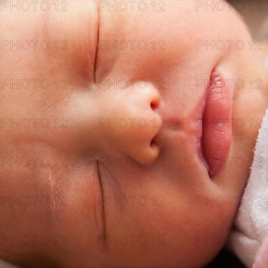 Baby girl (0-1 month) sleeping . Photo : Mike Kemp