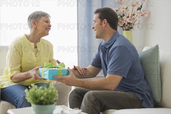 Senior woman with adult son.