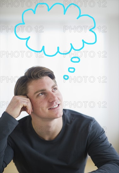 Man with thought bubble over head. Photo : Daniel Grill