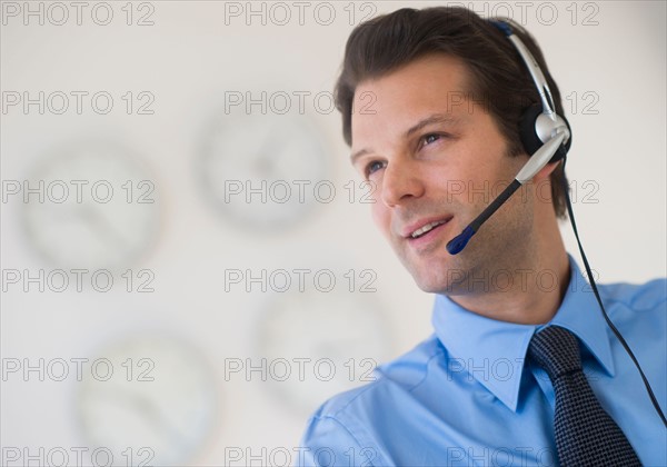 Portrait of male customer service representative.