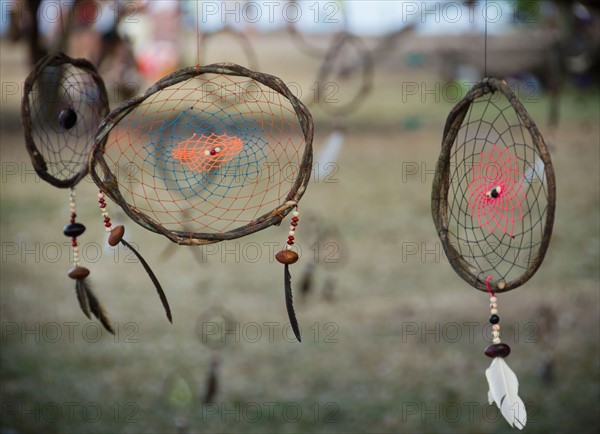 Brazil, Bahia, Trancoso, Dream catchers hanging. Photo : Jamie Grill Photography