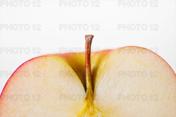 Close up of half of apple, studio shot.