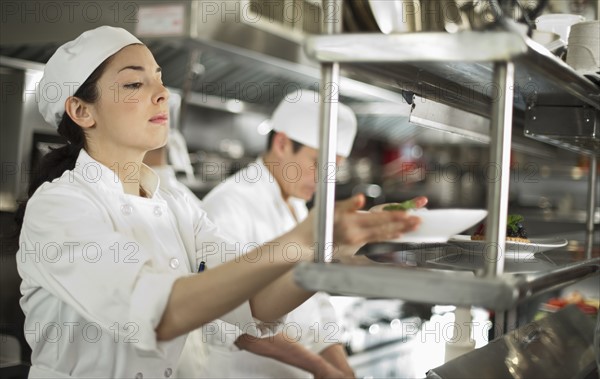 Chefs preparing food.