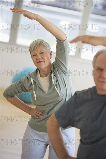 Senior people exercising.