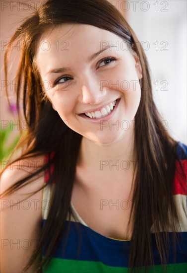 Portrait of smiling young woman. Photo : Jamie Grill Photography