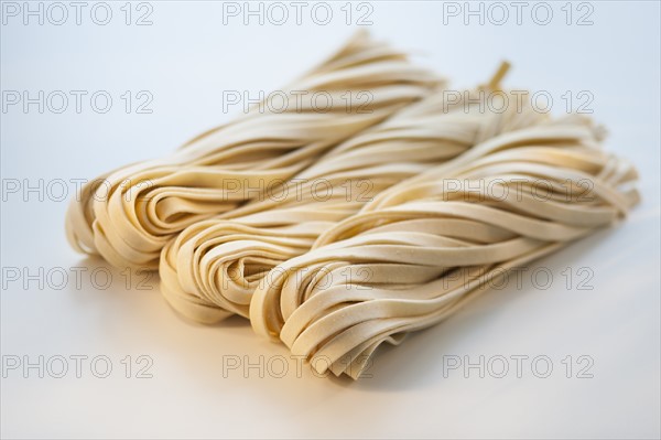 Studio shot of fresh linguini pasta.