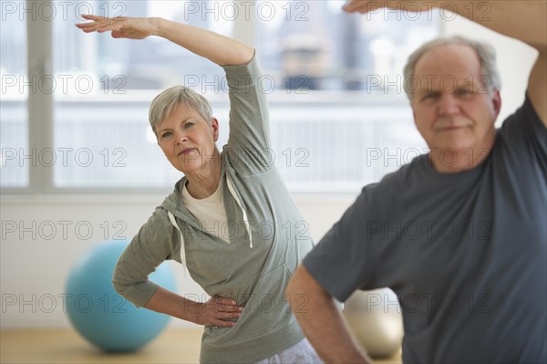 Senior people exercising.