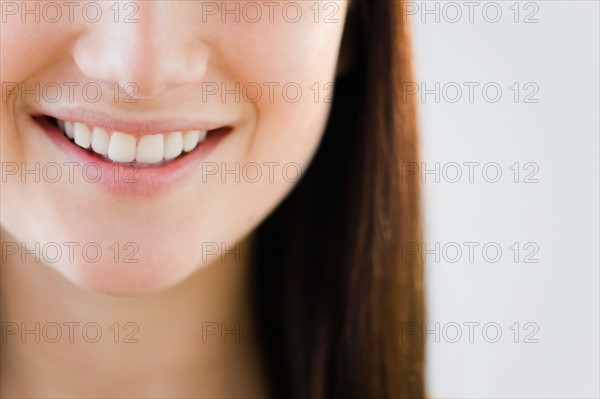 Close up of young woman's mouth. Photo : Jamie Grill Photography
