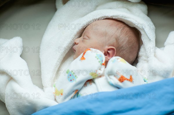 Baby boy (0-1 months) sleeping. Photo : Noah Clayton