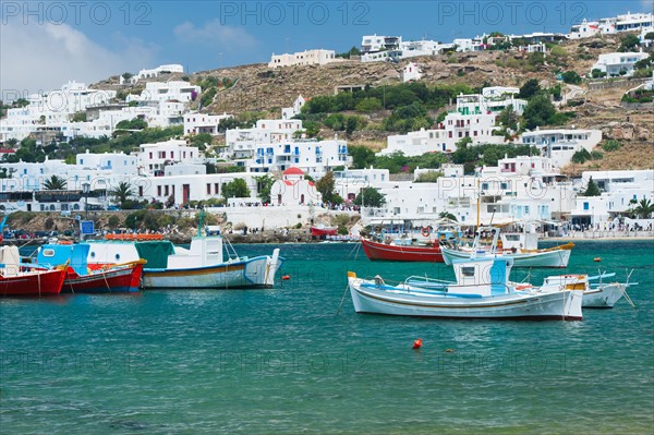 Greece, Cyclades Islands, Mykonos, Fishing boats in harbor.