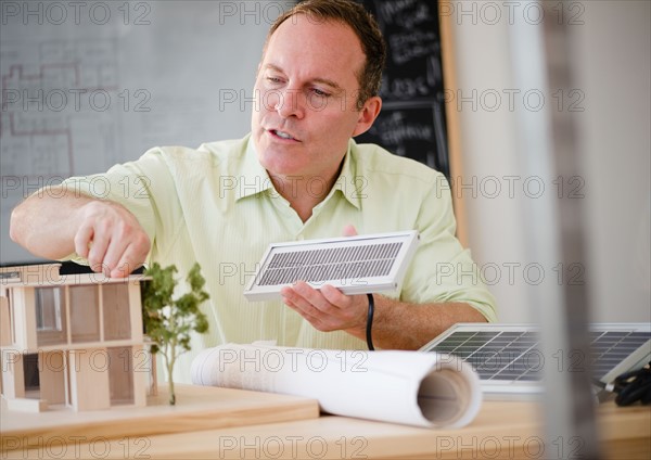 Architect working in office. Photo : Jamie Grill