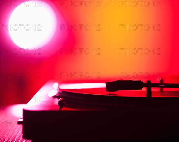 Close up of turntable on colored background. Photo: Daniel Grill