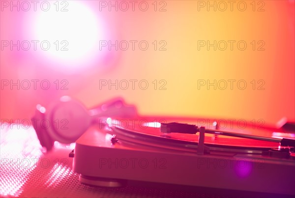 Close up of turntable on colored background. Photo: Daniel Grill