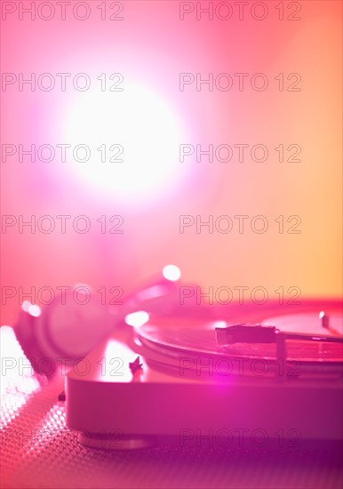 Close up of turntable on colored background. Photo : Daniel Grill