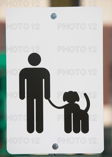 Dog walking sign, Close-up. Photo: fotog