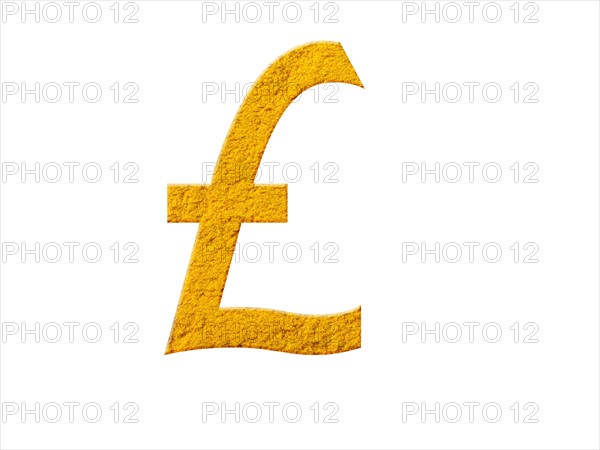 Studio shot of Mustard Powder making British Pound Sign on white background. Photo: David Arky