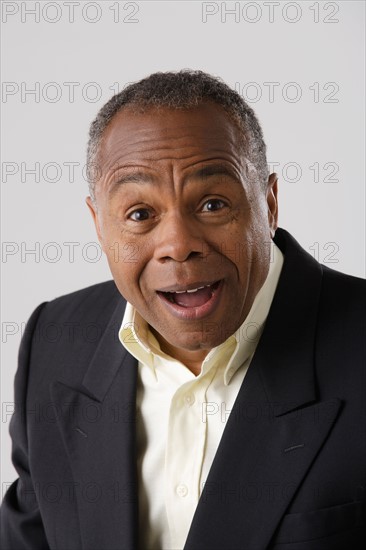 Portrait of mature businessman, studio shot. Photo : Rob Lewine