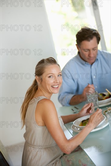 Mature couple eating meal. Photo : Rob Lewine