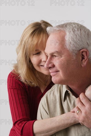 Portrait of elderly couple, studio shot. Photo : Rob Lewine