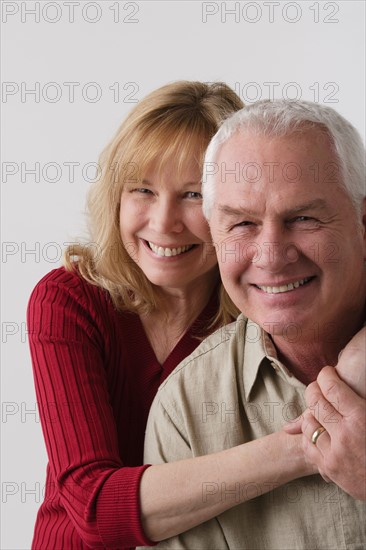 Portrait of elderly couple, studio shot. Photo : Rob Lewine