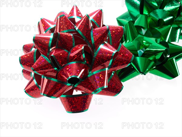 Studio shot of Red and Green Ribbon on white background. Photo : David Arky