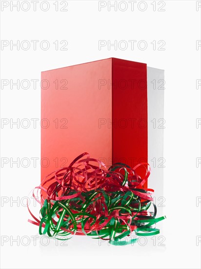 Studio shot of red Christmas presents with ribbons. Photo : David Arky