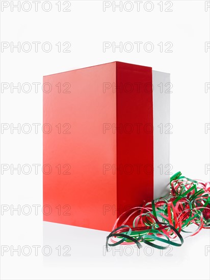 Studio shot of red Christmas presents with ribbons. Photo: David Arky