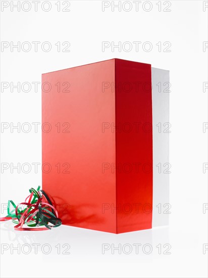 Studio shot of red Christmas presents with ribbons. Photo : David Arky