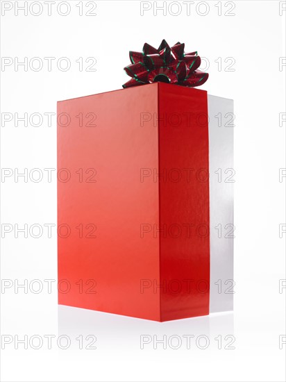 Studio shot of Red and Green Ribbon and Red Box on white background. Photo : David Arky