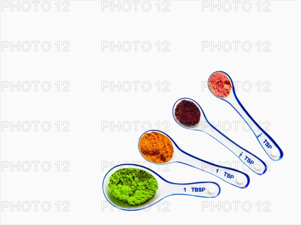 Studio shot of piles of spices on measuring spoons. Photo : David Arky